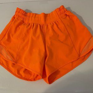 Lululemon Athletica Hotty Hot Low Rise 4" size 2 Highlight Orange